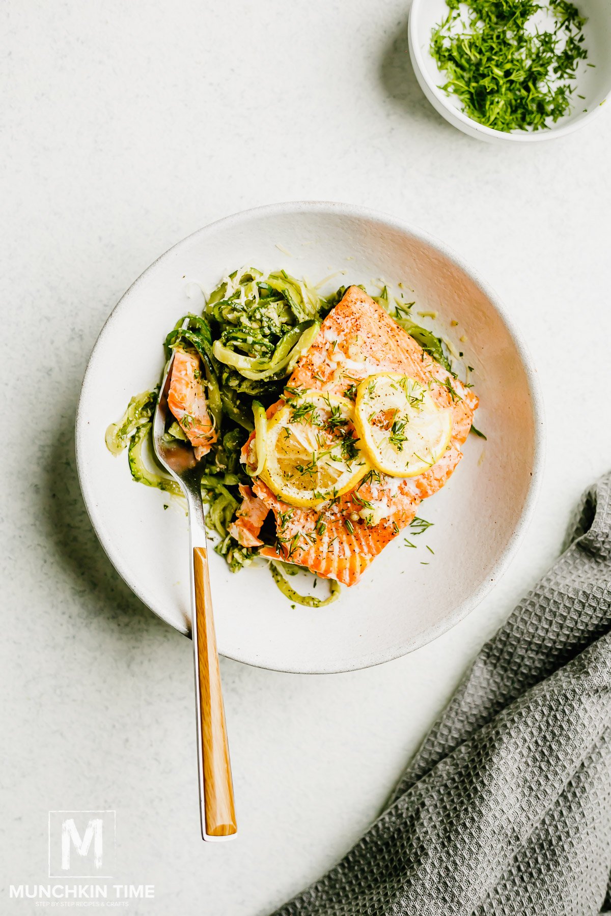 Oven Baked Salmon with lemon and zucchini noddles.