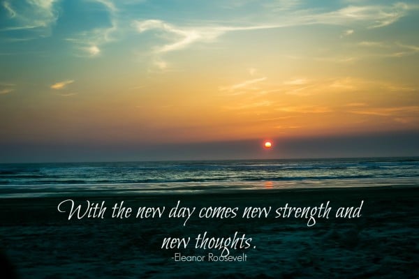 Sunset image with a quote of the day "With the new day comes new strength and new thoughts. "