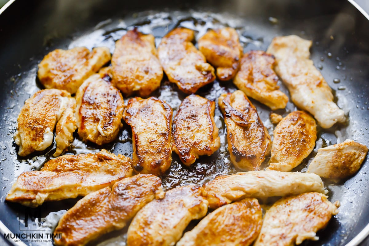 Cook pasta according to directions on the package. Season chicken with Cajun seasoning. Into a big skillet over medium heat add butter. After butter melts add chicken, sauté chicken until chicken is tender about 5-7 minutes.