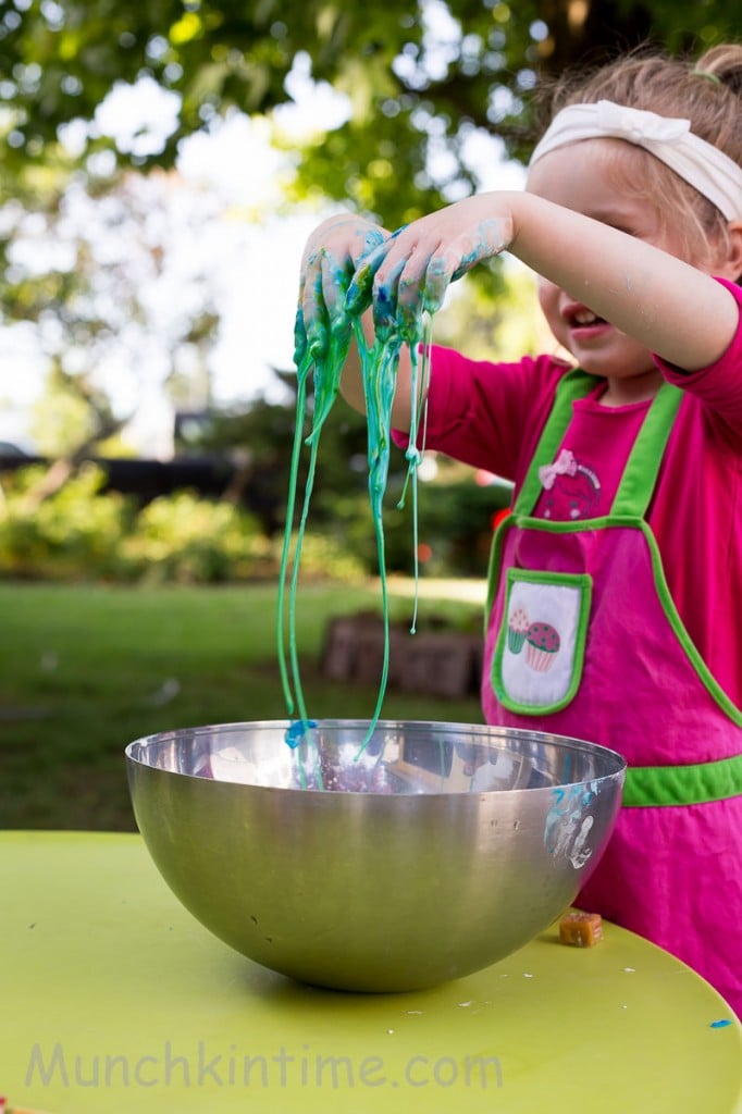 Girl playing with slime. 