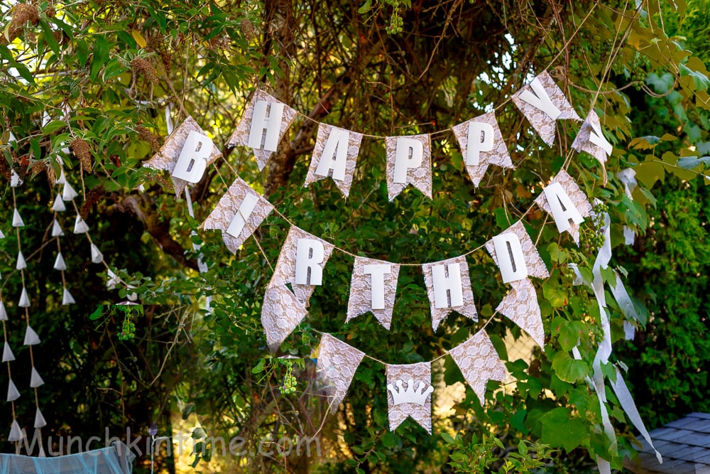 Birthday banner made out of burlap and lace. 
