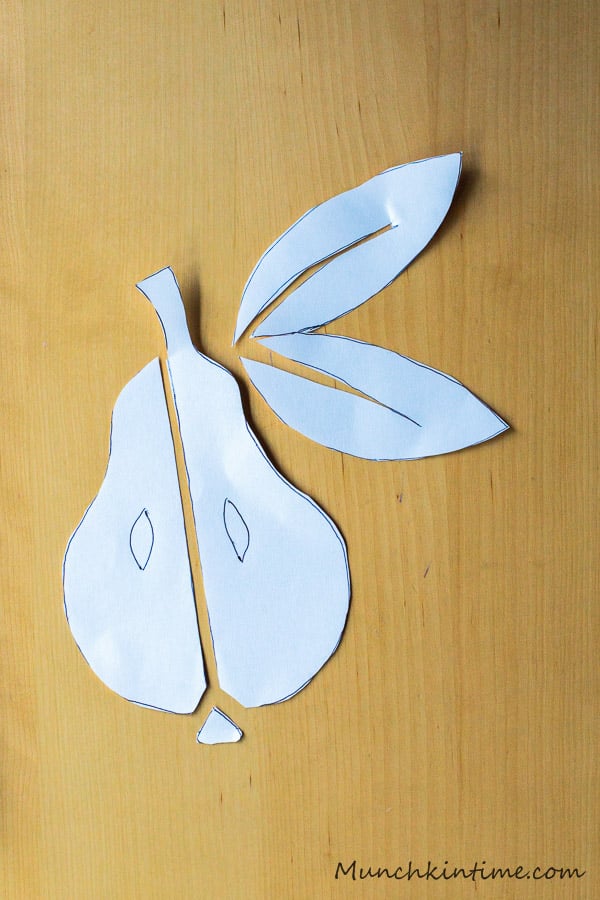 Cut out white paper pear.