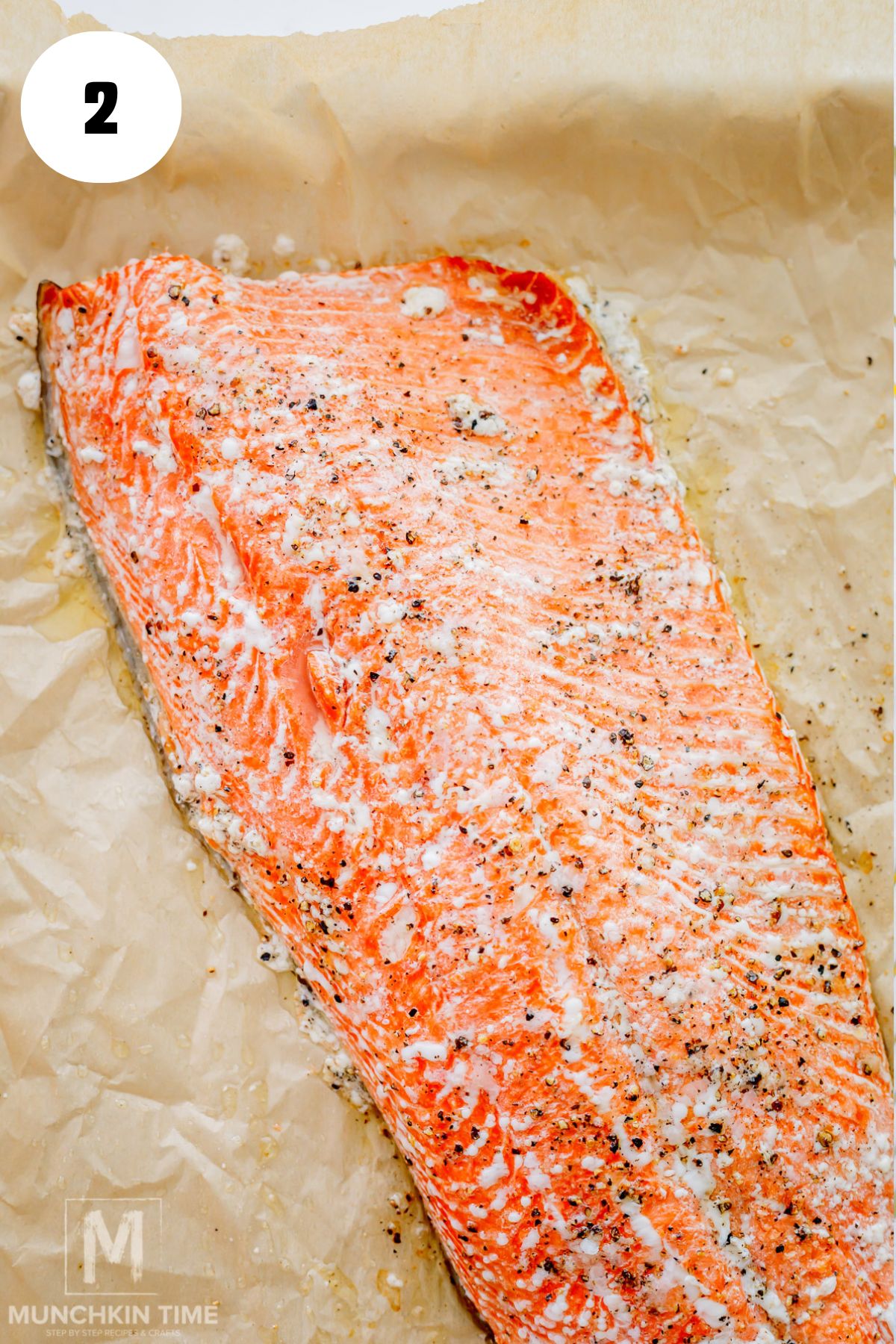 salmon done baking on a baking sheet.