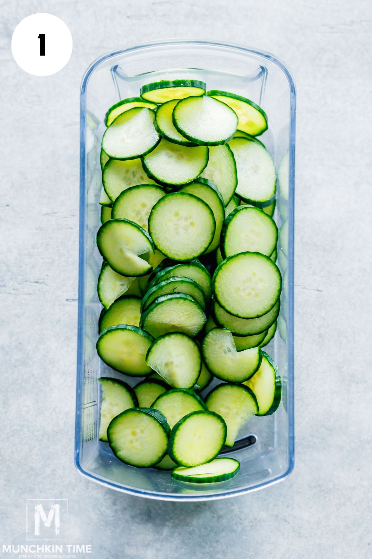 sliced cucumbers in a container.