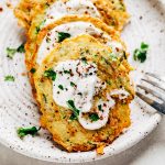 a stack of Zucchini Pancakes on a plate
