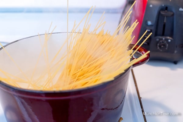 Pasta cooking inside the pot.