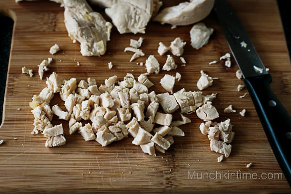 How to cut chicken into tiny pieces.