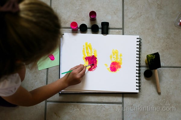 Girl Minions in pink Handprint Art from www.munchkintime.com-7