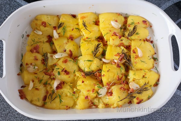 Roast potatoes with bacon and rosemary and garlic.