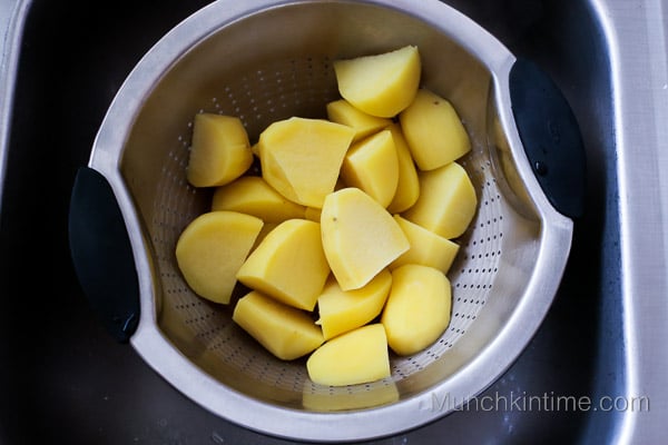 Place potato into colander and let it set there for few minutes so all of the water drains.