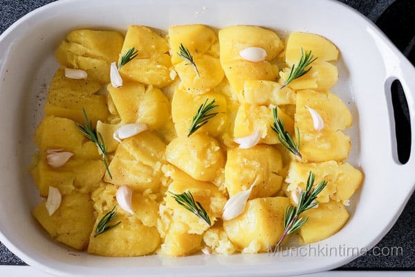 Roast potatoes in a baking sheet.