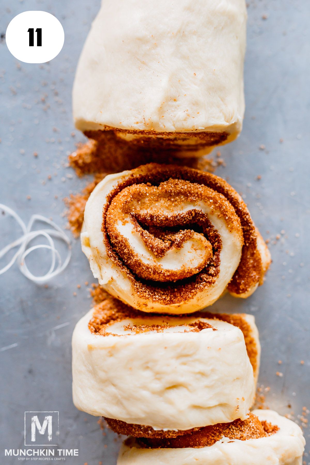 dough roll with cinnamon cut into slices.