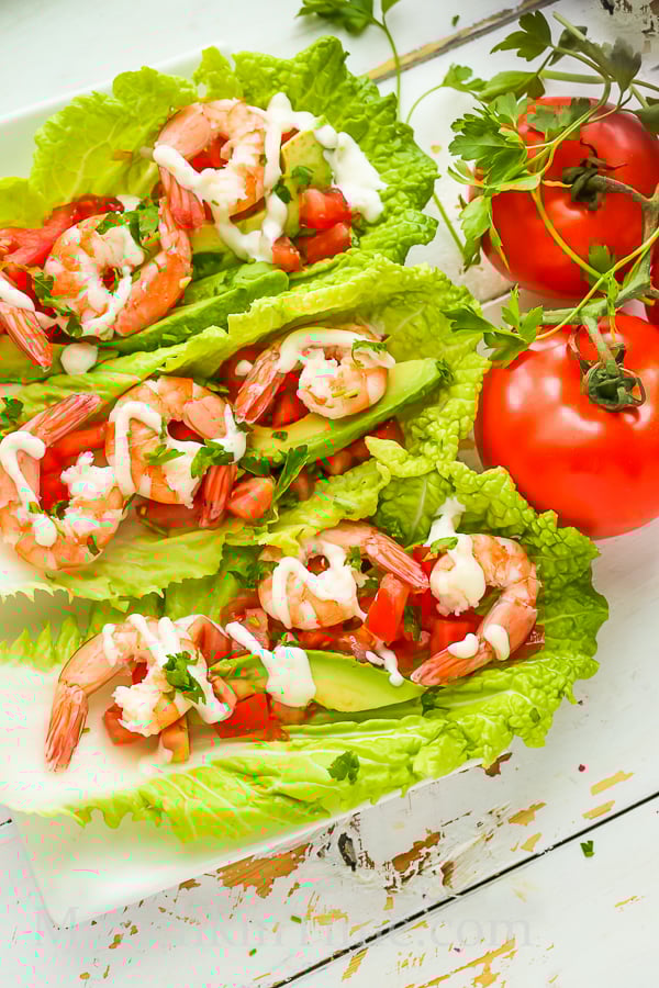 Healthy and delicious Shrimp Lettuce Wraps Recipe - made of Napa cabbage, avocado, tomato, parsey, lemon, pine nuts, mayo, and shrimp. Super delicious and perfect for healthy lunch ideas. #shrimprecipe #healthylunchideas
