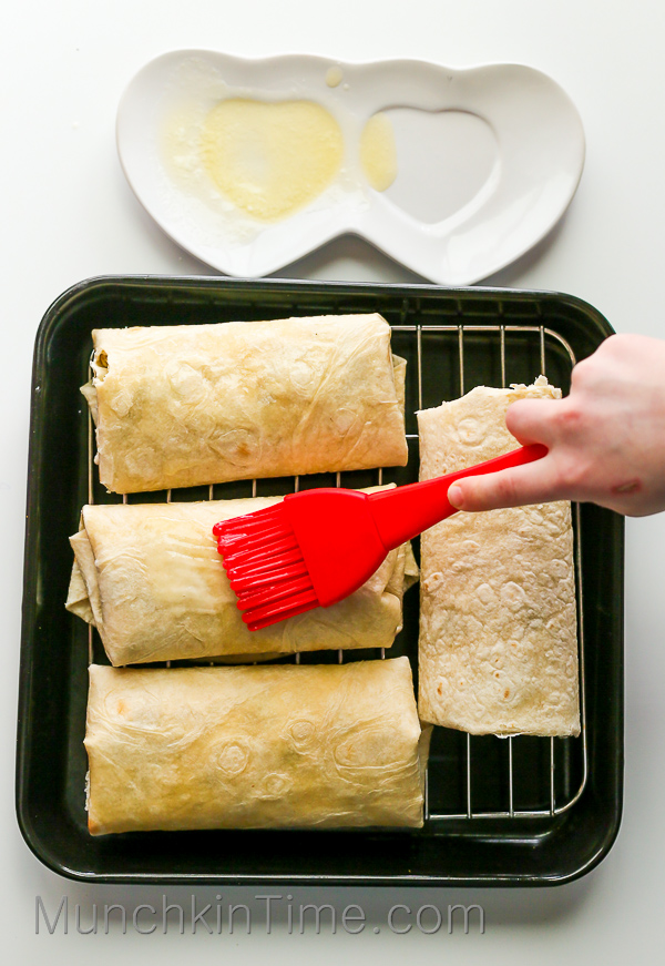 Butter spread over Chimichangas.