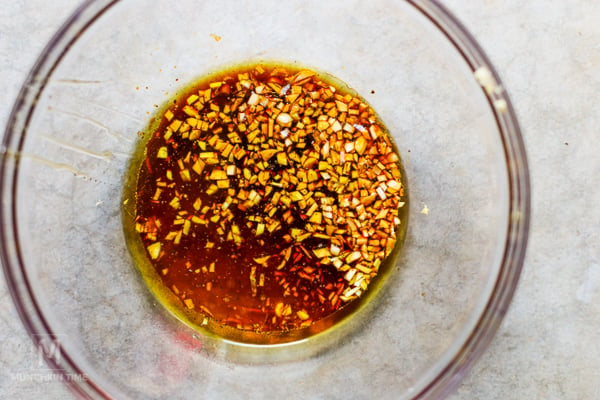 Marinating ingredients mixed inside the mixing bowl.