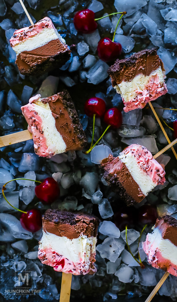 Oreo Ice Cream Cake Pops Recipe - Made of Oreo cookies, cherry, vanilla and chocolate ice cream. SO Good!!!