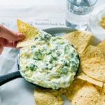 Out of this world delicious Spinach Artichoke Dip - cooked in crock pot!