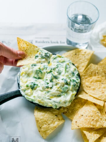 Out of this world delicious Spinach Artichoke Dip - cooked in crock pot!