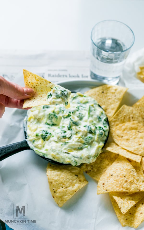 Out of this world delicious Spinach Artichoke Dip - cooked in crock pot!