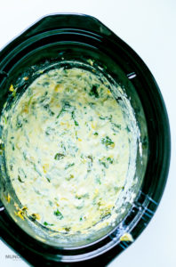 Out of this world delicious Spinach Artichoke Dip - cooked in crock pot!
