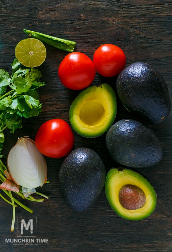 Guacamole Recipe Simple tailgate party food! Made of ripe avocados, jalapeno, tomatoes on the wine, onion, freshly squeezed lime juice and lots of cilantro. Game on baby!