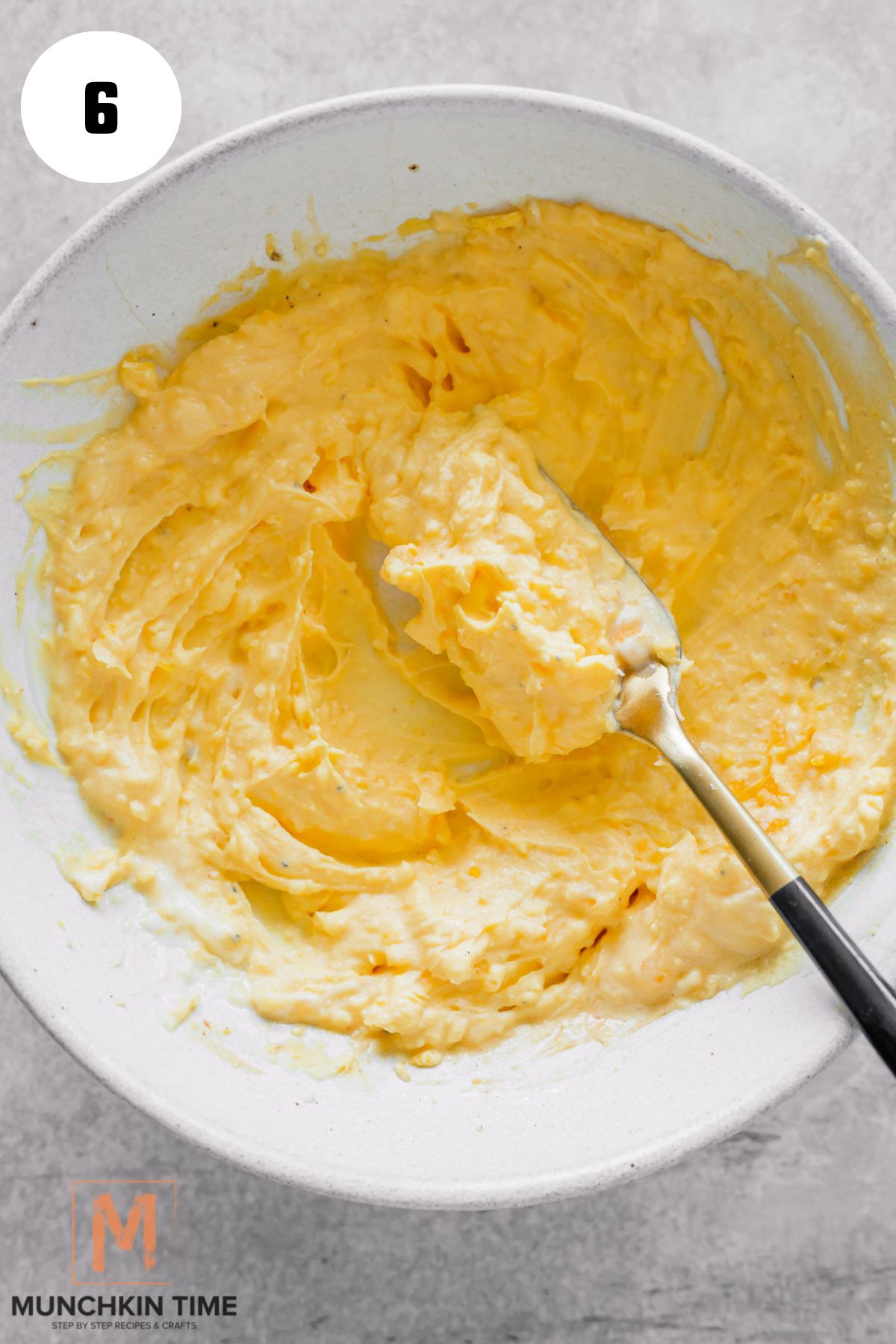 mashed egg yolk mashed with a fork.