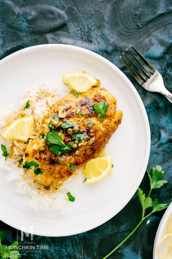 35 Minute Chicken Piccata Recipe - made of pounded chicken breast, freshly squeezed lemon juice, garlic, onion, capers and white wine sauce. It's Ridiculously Delicious!!! - https://www.munchkintime.com/