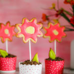 Delicious Mother's Day Flowers - made of Easy Cookie Recipe, colorful icing and chocolate muffins covered with shaved chocolate.