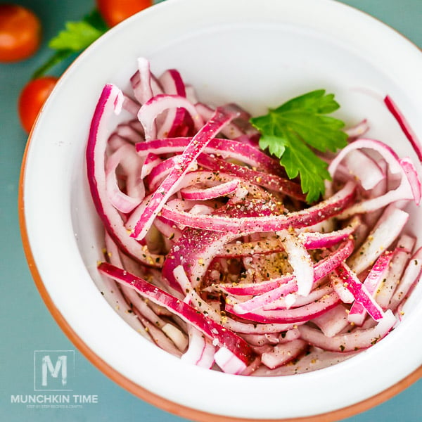 In mixing bowl - add onion, 2 tablespoons of vinegar, salt and pepper to taste. Mix and set aside.