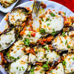 Loaded & Baked Eggplant Recipe - loaded with saute onion, carrots, tomatoes and mozzarella cheese. This eggplant side dish is So Good!!!