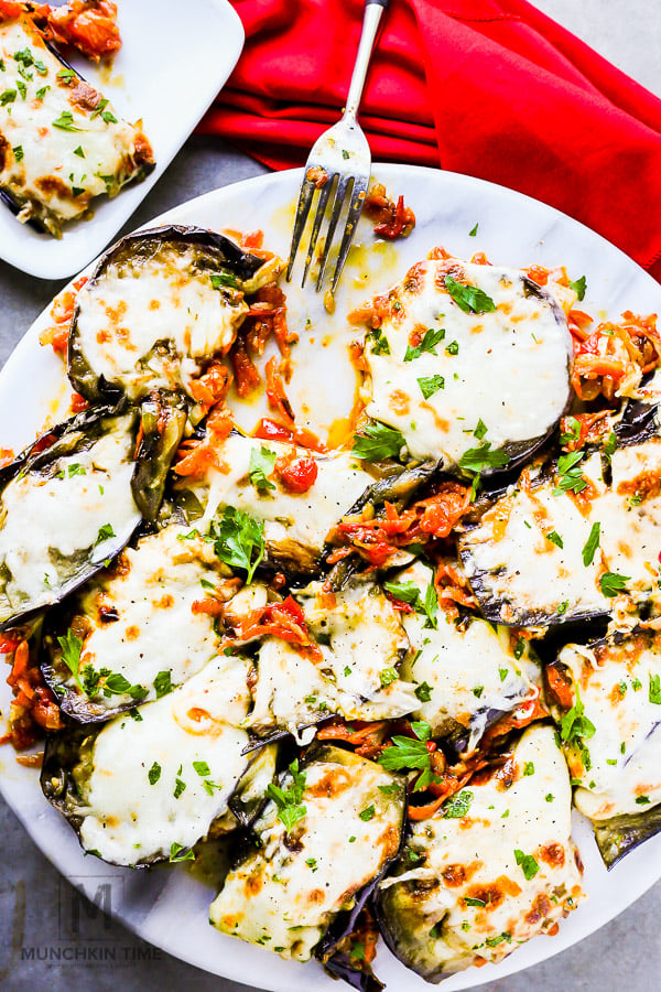 Loaded & Baked Eggplant Recipe - loaded with saute onion, carrots, tomatoes and mozzarella cheese. It's So Good!!!