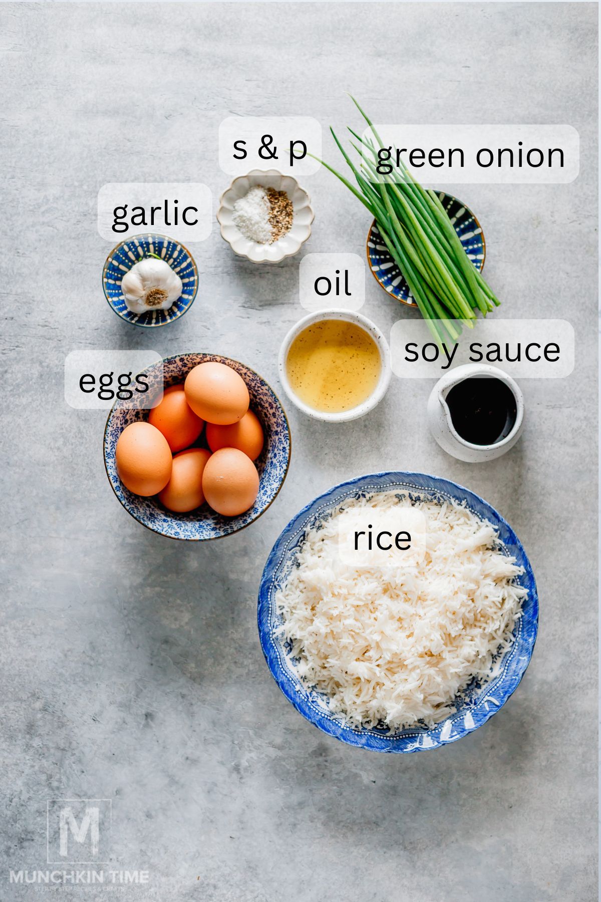 Ingredients for easy fried rice recipe including rice, eggs, garlic, soy sauce or tamari, and green onions.