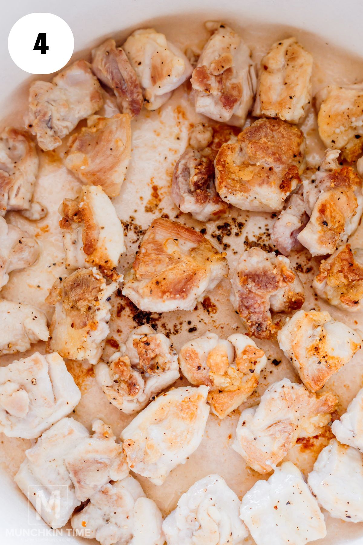 Browning chicken thighs in a dutch oven until golden for Spanish chicken and rice