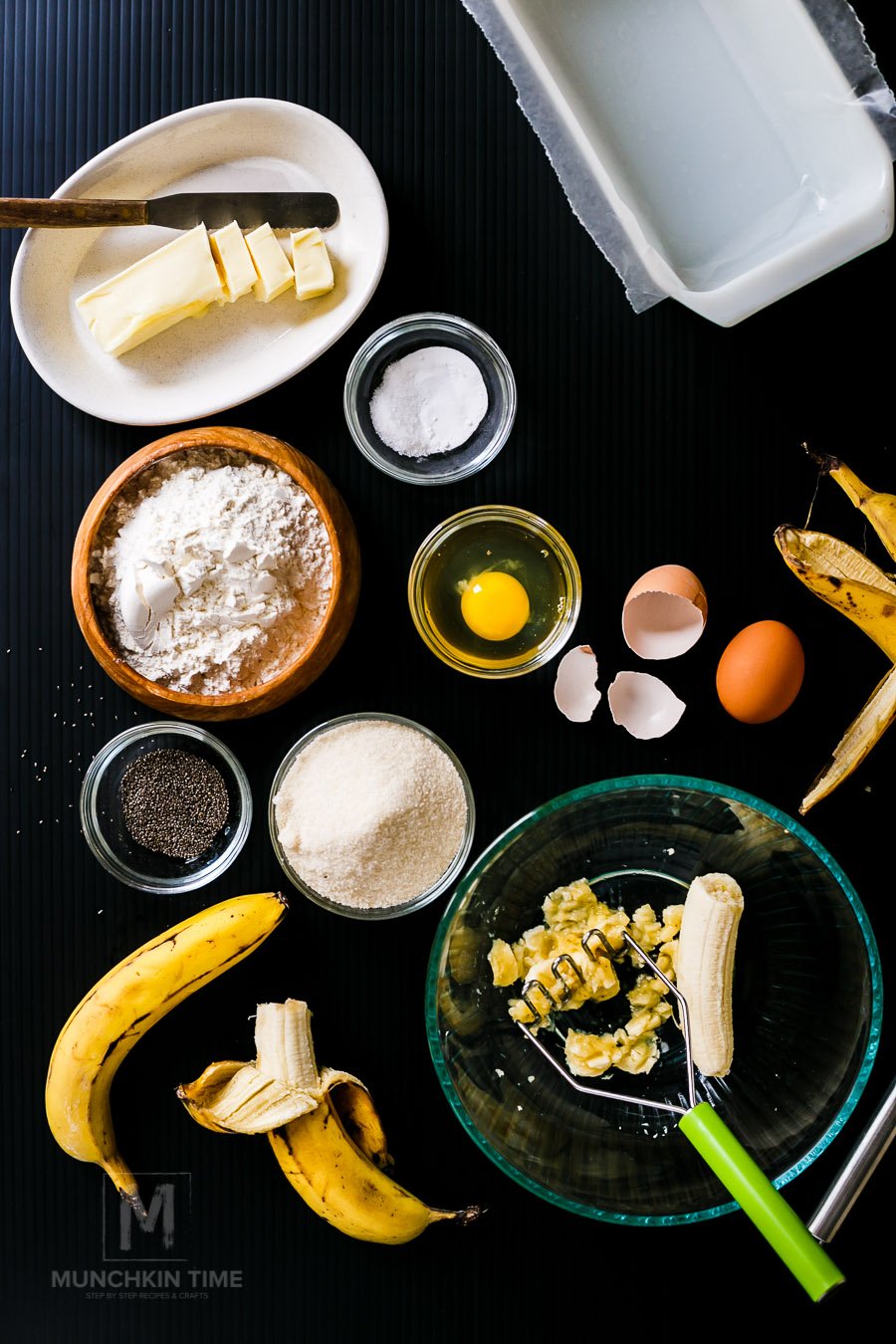 Ingredients for Banana Bread laying on a table. 