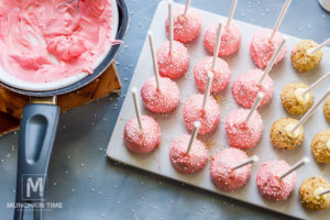 coated with pink chocolate cake pops