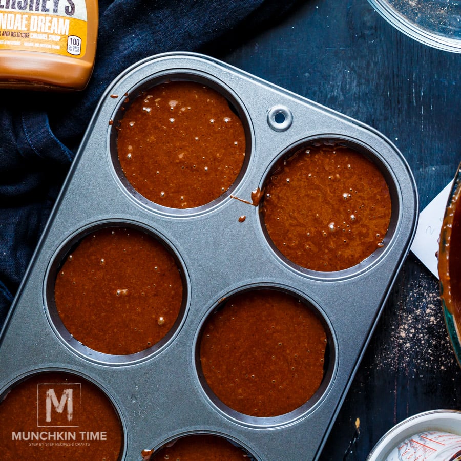 batter in a muffin pan ready for baking.