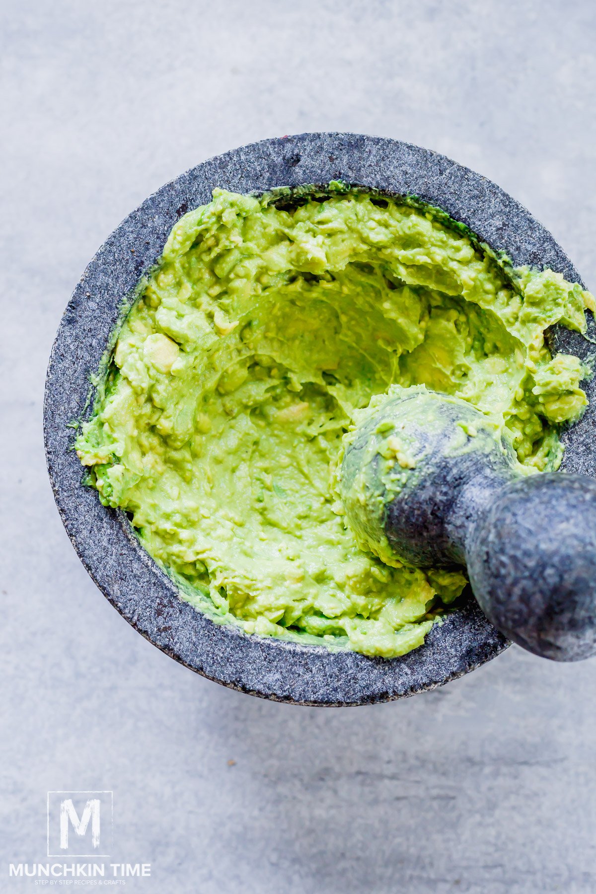 Smashed avocado in a bowl.