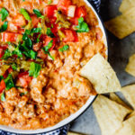 The Best Hatch Green Chile Cheese Dip Recipe - Bring the queso dip to a boil , remove from the heat. Garnish with fresh diced tomatoes, diced hatch Chile peppers and cilantro, if desired. Serve warm with tortilla chips. Enjoy!