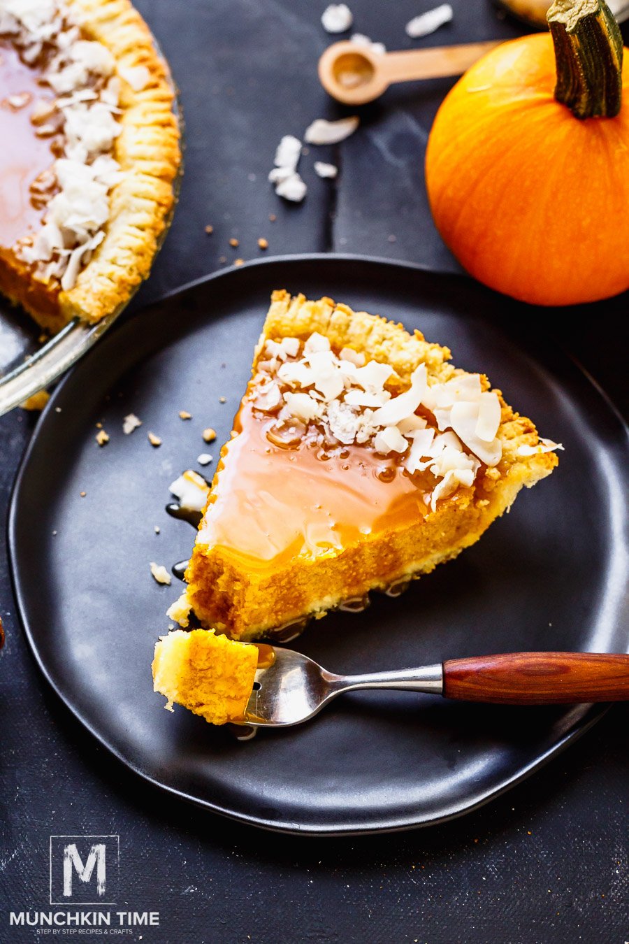 !How to make Pumpkin Pie: Preheat the oven to 350F. Using food processor or a blender. Combine 2 1/2 cups of fresh pumpkin puree, 1 egg, 1/8 of salt, 1/2 teaspoon ginger, 1 teaspoon ground cinnamon, 1/2 teaspoon nutmeg, 1/8 teaspoon ground cloves, and 1 can of condensed milk. Pulse until everything is combined, then pour the pumpkin filling into a prepared gluten free pumpkin crust. Bake for 55 - 60 minutes, or until knife inserted in the center comes out clean. Let the pumpkin pie cool. Drizzle the caramel over the top and garnish with coconut flakes. Cut a slice and enjoy!