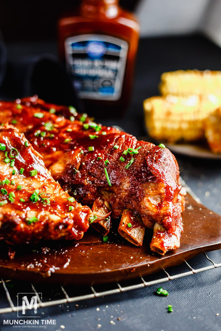 These BBQ Ribs will make your mouth water!  Pressure cooked in apple juice and cayenne pepper for the best Smoky BBQ Ribs flavor.  After baked on high heat to create the most stickiest & caramelizing top layer.  So pick up those long sleeves & enjoy the most Juiciest BBQ Ribs Recipe.