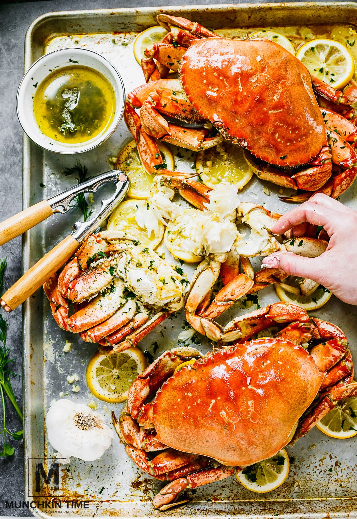 The Best Oven-Roasted Dungeness Crab Recipe: Dungenuss Crab oven roast in garlic butter sauce until perfection.