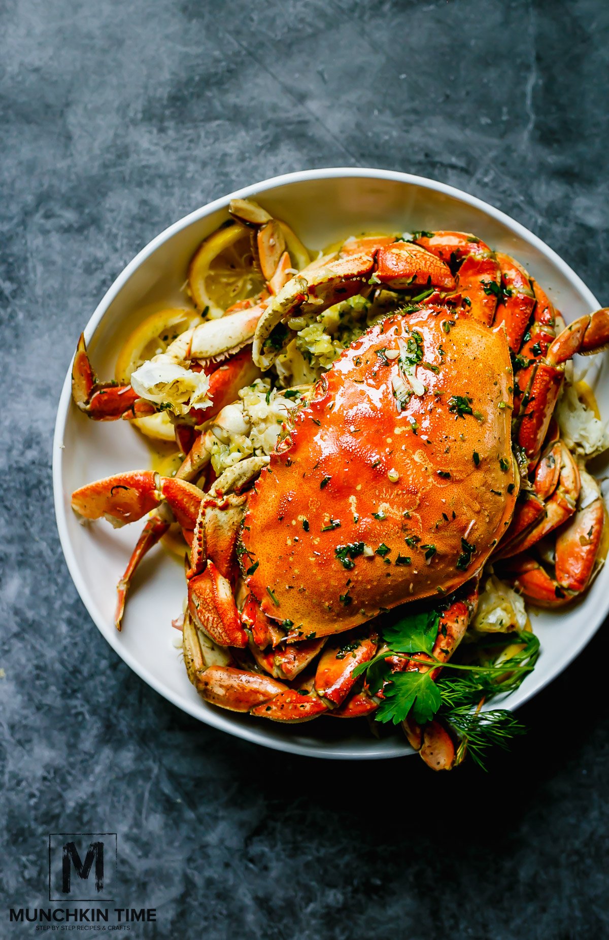 The Best Oven-Roasted Dungeness Crab Recipe: Dungenuss Crab oven roast in garlic butter sauce until perfection.