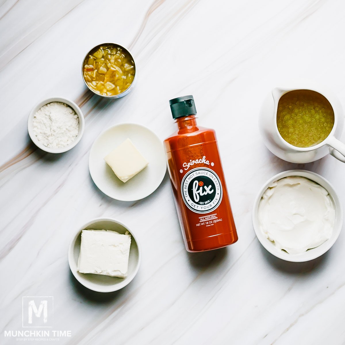 7 ingredients on a table ready to make Mexican White Sauce Recipe.