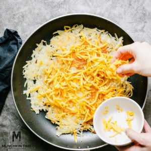 Cheesy Breakfast Pizza with hash brown crust.