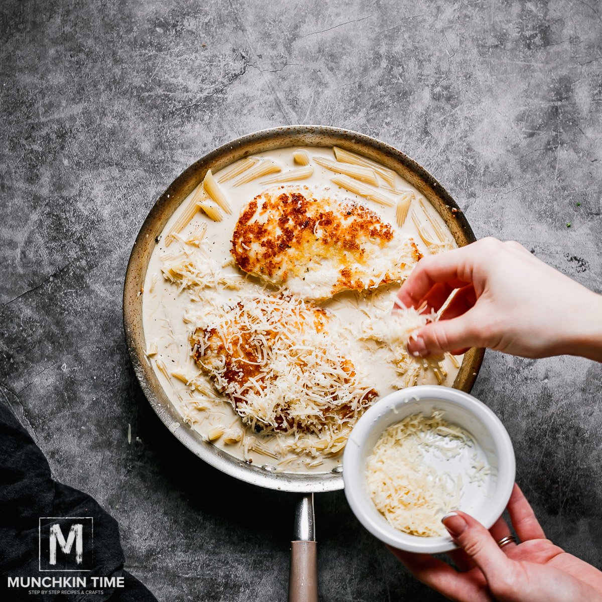 Oven Baked Chicken Pasta in Buttery White Sauce and cheese.