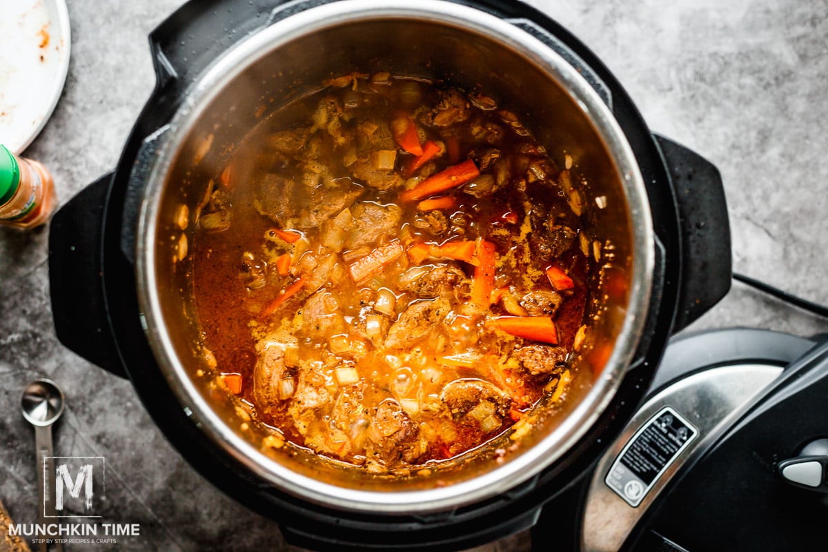 Pour in 2Â½ cup of water, or enough water to cover the meat and veggies. Cover with a lid and cook on meat/stew setting for 15-20 minutes. Quick release the pressure.