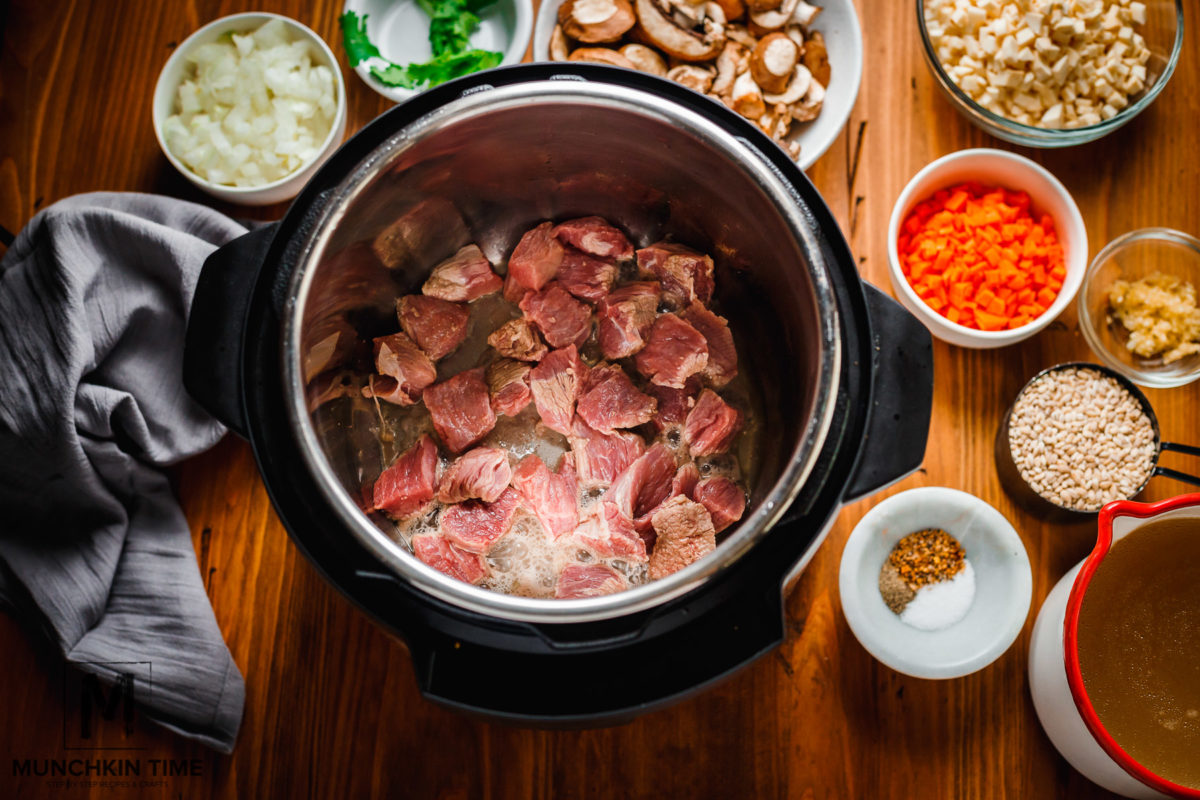 Step one: brown meat for 10 minutes inside Instant Pot.