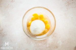 Whisk eggs with sugar until fluffy.