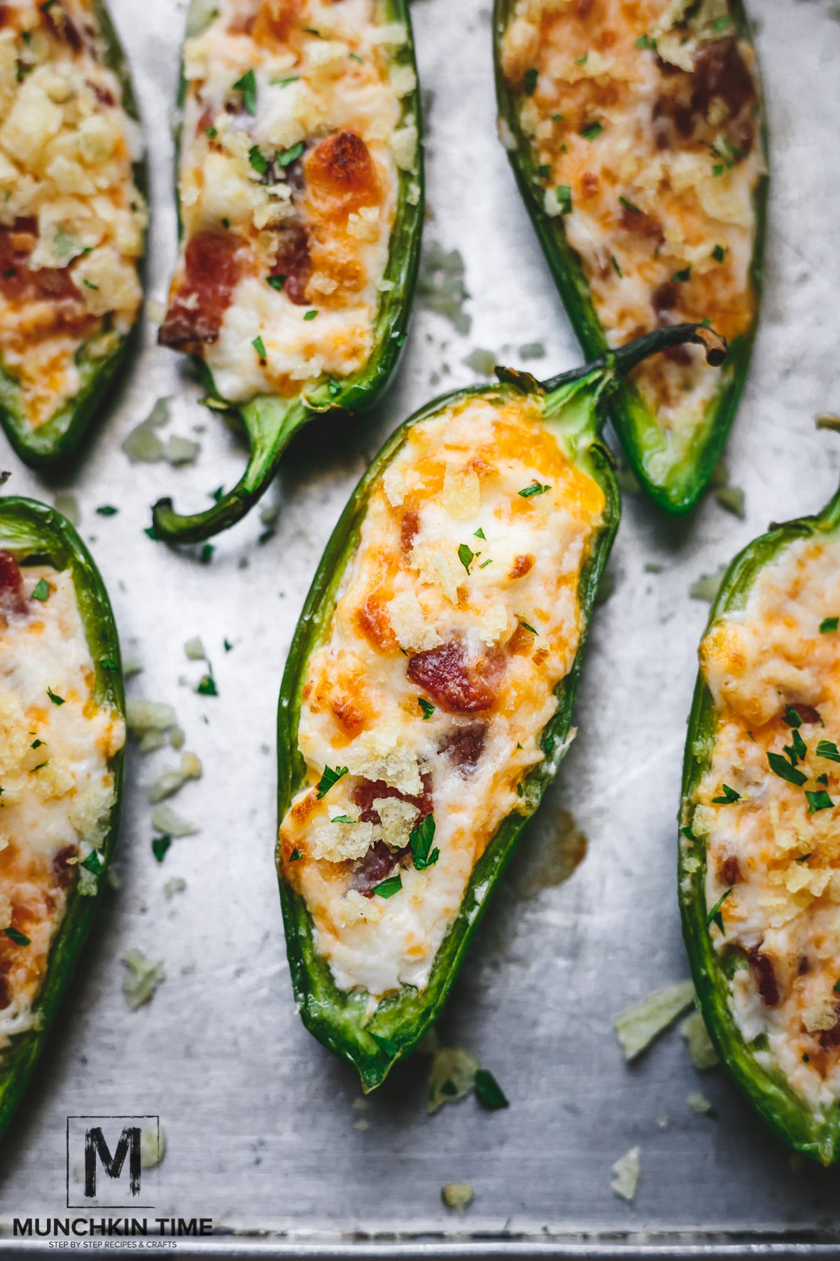 baked bacon jalapeño poppers filled with cream cheese and cheddar.