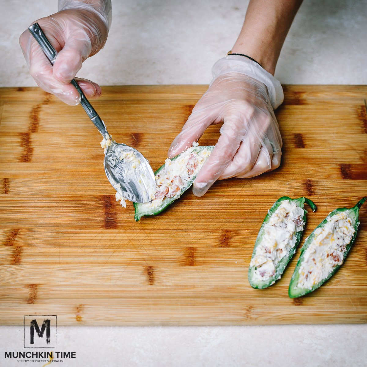 Stuffed jalapeño peppers with cream cheese, bacon & cheddar cheese.